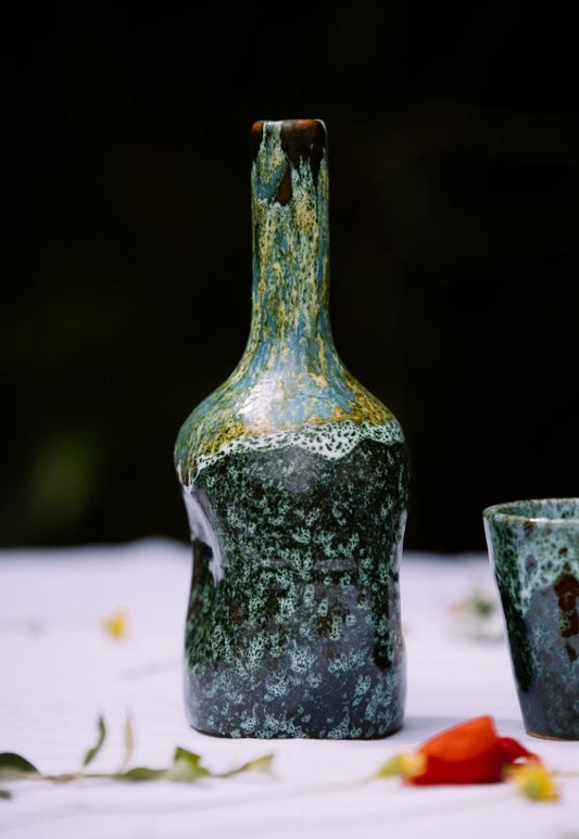 Bouteille en céramique bleu et vert