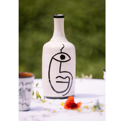 Bouteille en céramique cyclope façon Picasso